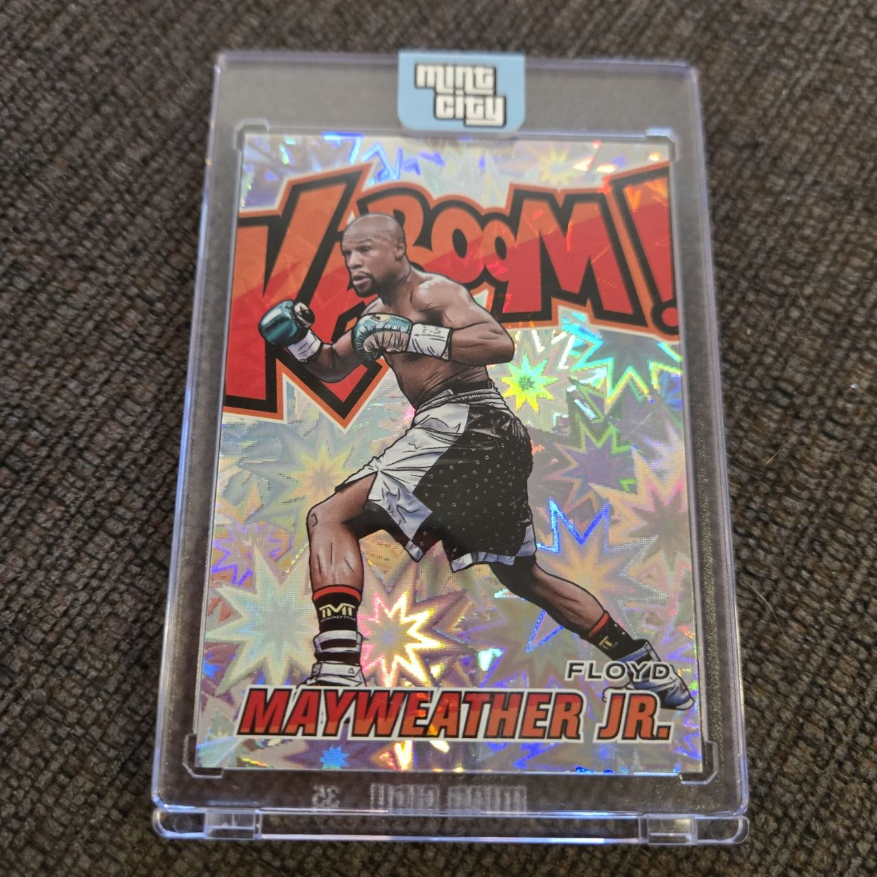 Floyd Mayweather Jr. comic-style insert card in a slab-style holder